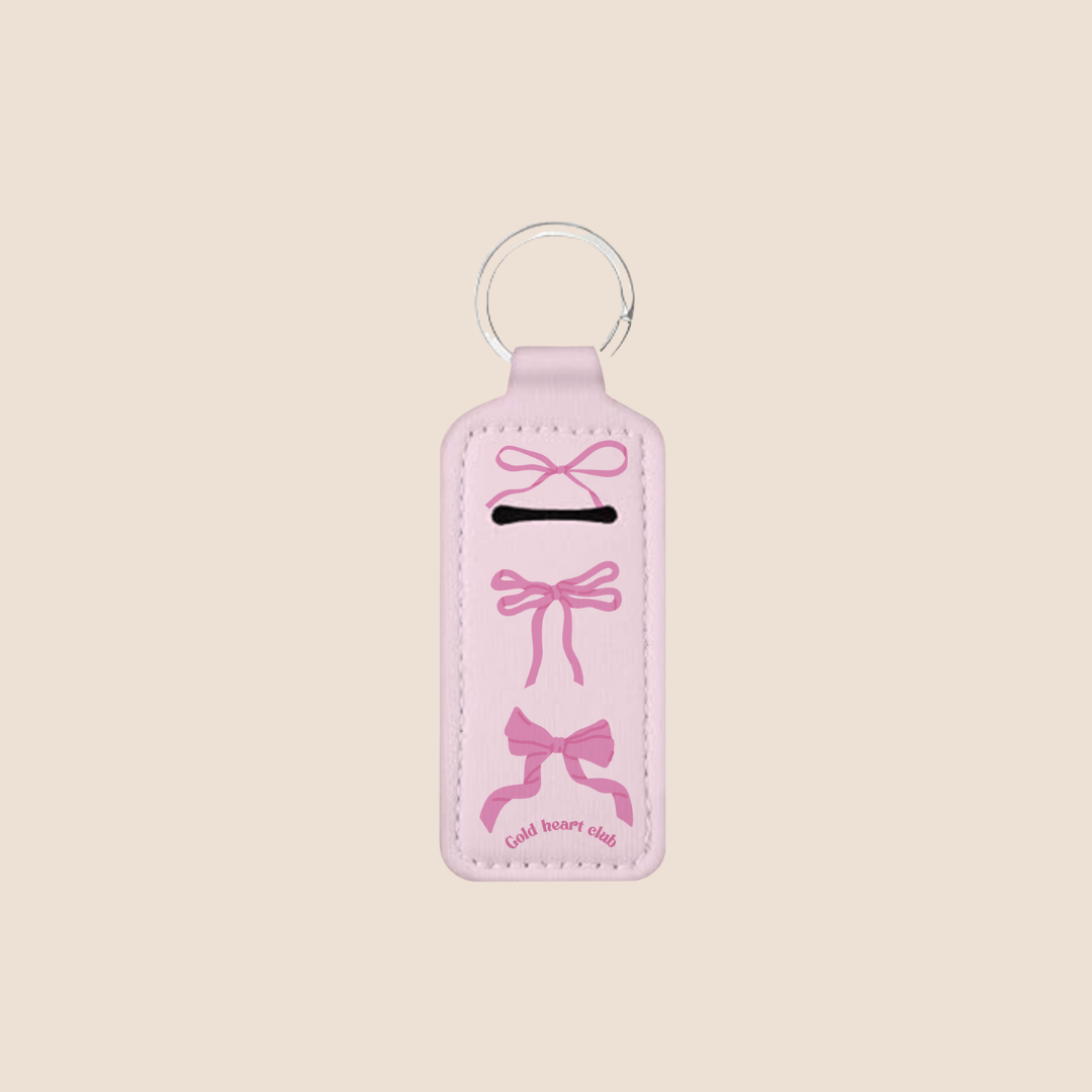 Porte-baume à lèvres avec motif de boucles roses, format pratique