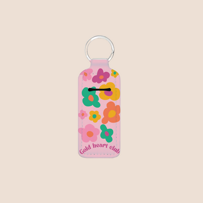 Porte-baume à lèvres illustré de fleurs colorées et joyeuses