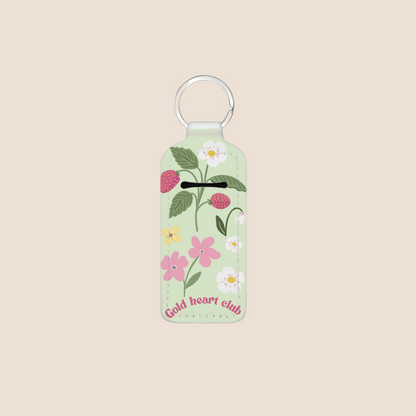 Porte-baume à lèvres avec illustrations de fraise et petite fleur